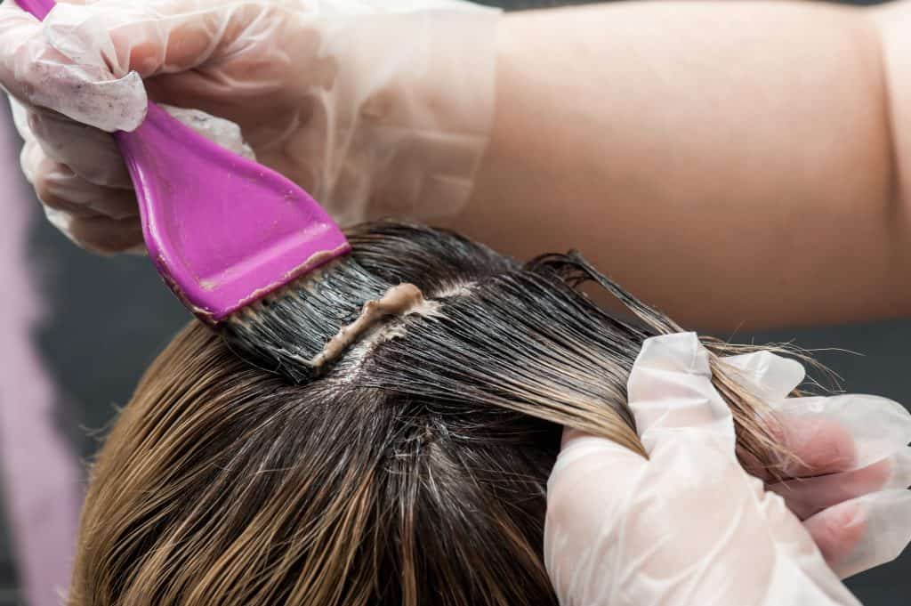 dyeing blonde hair to black with pink brush