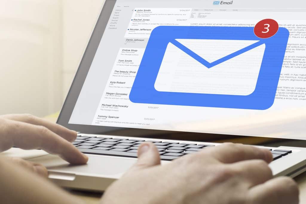 man checking his email to see his tesco gift card balance
